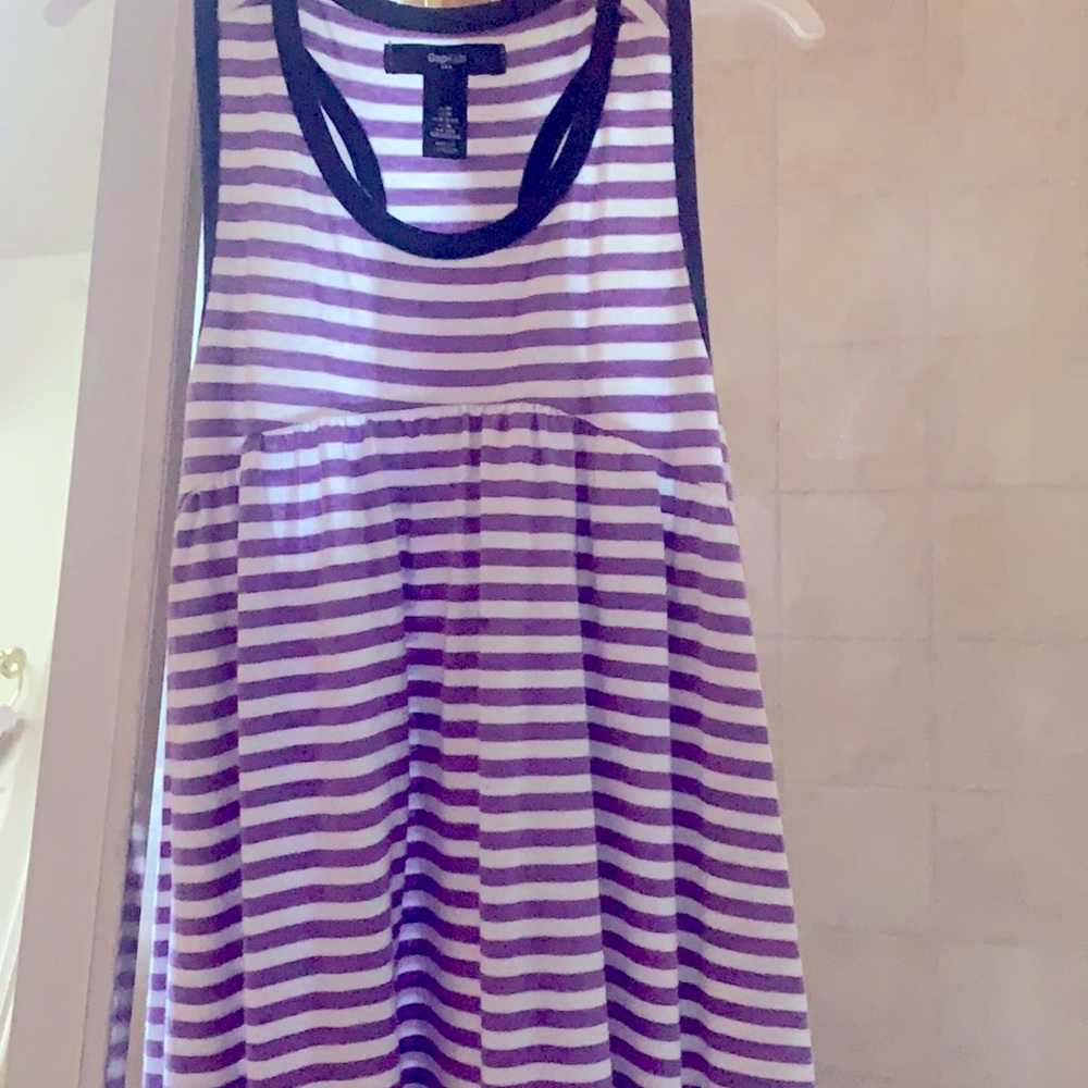 I am selling a Purple Little Girls Sundress.